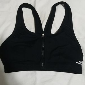 Black zip-up closure sports bra